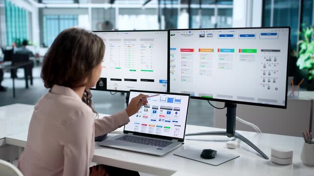 UX Designer Carefully Reviews App Interface