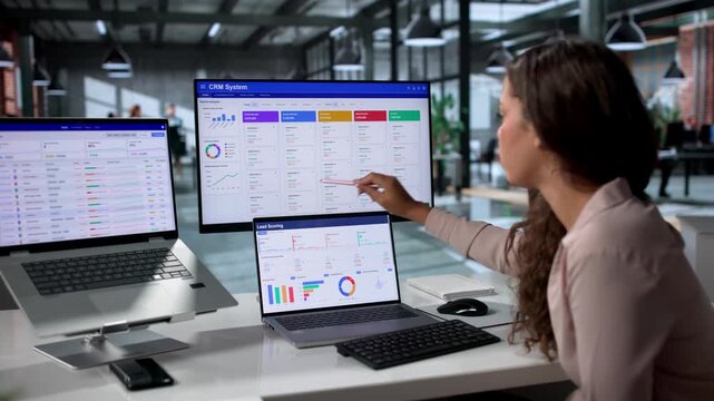 Young Hispanic Woman Working On Laptop