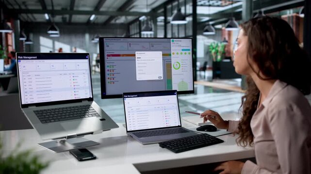 Third Party Risk Manager Analyzing Vendor Compliance On Laptop