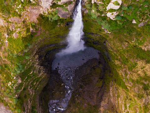 Miradouro da Garganta Funda waterfall, Ponta do Pargo Madeira Portugal, plunging into a deep volcanic gorge near the Atlantic coast.