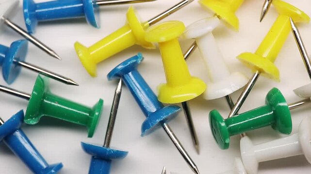 Stationery, Colorful push pins rotating, push pins rotating on the table