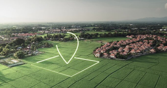 Aerial drone footage of land with location marker and boundary overlay, representing land for sale, property investment, real estate opportunity, land parcel identification and GIS mapping.