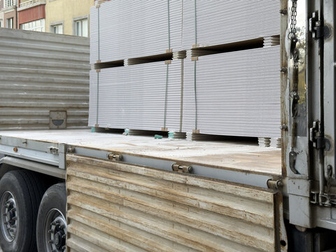 View of stacks of plasterboard sheets loaded on a flatbed truck for delivery in Sariyer, Istanbul, Turkiye.