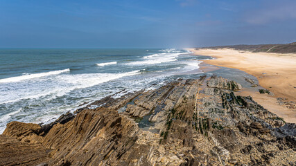 Fototapeta premium Farol Penedo da Saudade is a beach in Portugal on the Atlantic ocean