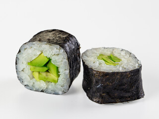 Fresh avocado maki sushi rolls isolated on white background © Andrei Starostin