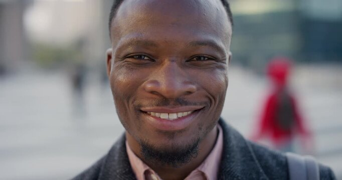 Business, face and smile with happy man in city for ambition, career or job satisfaction. Commute, confidence and opportunity with employee person outdoor in urban town for morning travel to work