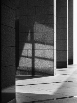 Concrete columns rows Shade shadow Architecture details Building Grey texture shade lighting Monochrome background 