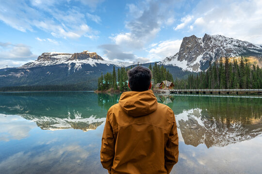 Man contemplating view of Emerald Lake in Yoho National Park