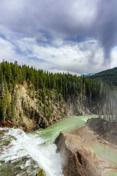 Wapta Falls flowing through Yoho National Park landscape