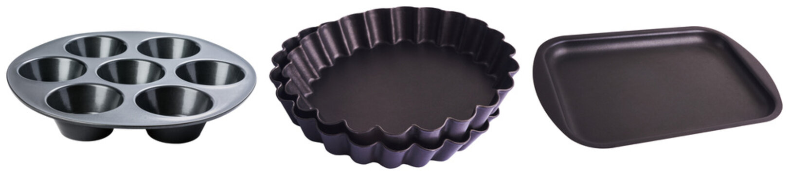 Set of baking pans: muffin tin, fluted tart pans, and a baking sheet, isolated on white background.