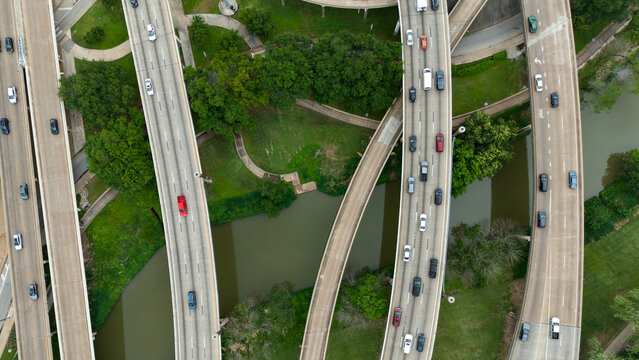 Top down aerial view of Houston Texas freeway bridges with traffic