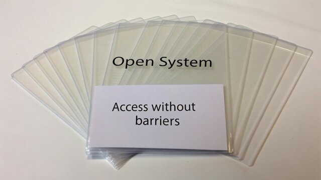 Transparent holders displaying an open system message promoting access without barriers for communication and information sharing