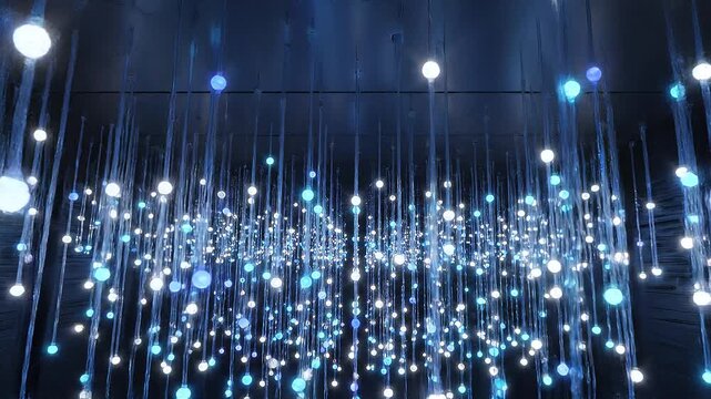 Installation lumineuse futuriste de sph&egrave;res LED bleues et blanches suspendues