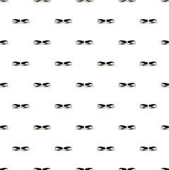 Fototapeta premium Green ninja eyes repeated in a seamless pattern expressing secrecy and vigilance
