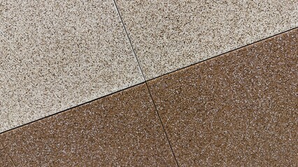 Fototapeta premium Minimalist geometric tile texture, diagonal brown and beige speckled stone background for layout