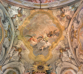 Obraz premium MONZA, ITALY - MARCH 19, 2026: The baroque fresco of angesl with the crown (marianic symbol) in the Cathedral by Carlo Innocenzo Carloni (1738 -1740).