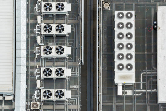 Aerial view of industrial cooling units and HVAC systems on the rooftop of the AI data center in Warsaw, Masovian Voivodeship, Poland.