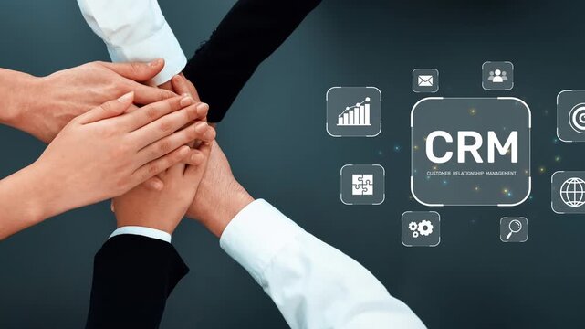Close-up of diverse hands stacking together as a symbol of teamwork over a digital CRM concept, showcasing business strategies and effective relationship management. Raster