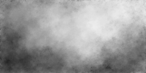 Obraz premium A dark and stormy night sky filled with clouds of smoke and mist over a textured black and white grunge metal background