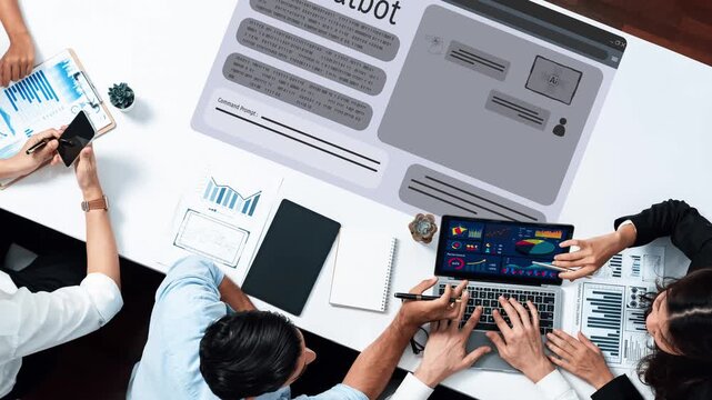 A diverse team collaborates on an innovative chatbot design, analyzing data and discussing strategies in a modern office setting. The vibrant visuals enhance creativity. Raster