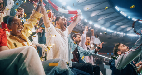 Naklejka premium Portrait of Black Female and White Male Soccer Football Fans in Stadium Stands During Championship Match, Raising Scarves as Confetti Falls, Happy, Smiling, Excited, Lifting Scarves to Cheer.