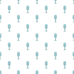 Fototapeta premium Retro microphones creating a seamless pattern representing audio communication