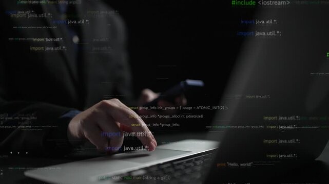 A focused programmer operates a laptop while using a smartphone in a dark setting. Floating code and binary elements create a high-tech atmosphere, ideal for tech-related projects. Xenic