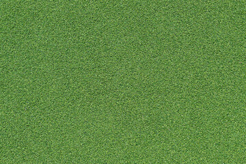 Close up of green artificial turf texture, flat lay abstract background for sports, eco and environment concept © Seyryu