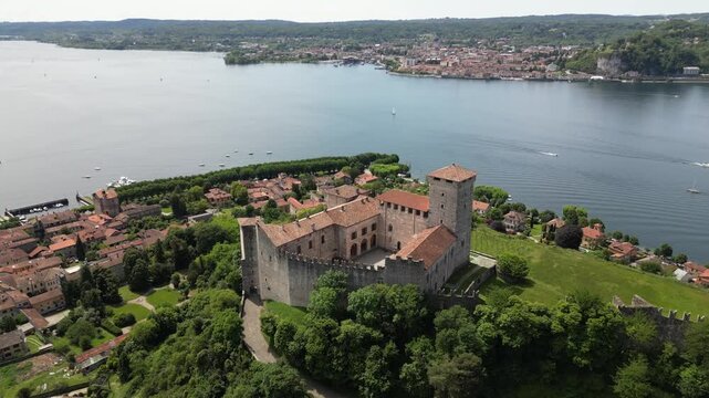 Europe, Italy, Angera province of Varese , The Borromean Fortress  Castle of Angera on Lake Maggiore. The fortress's historic rooms  is Doll and Toy Museum - tourist attraction destination sightseeing
