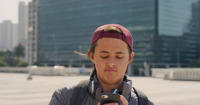 Teen, student and scroll in city with phone, social media and thinking for location search on commute. Boy, child and reflection in urban town with tech, check digital map or direction for new school