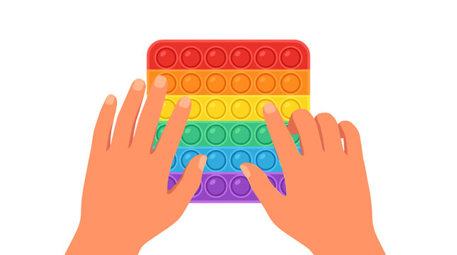 Hands pressing rainbow pop it sensory toy on white background