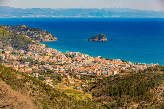 Aerial panoramic view of the coast of Spotorno, Bergeggi Island, Torre del Mare, Liguria, province of Savona, Italy. Riviera dei Fiori. Western Riviera. Ligurian Sea