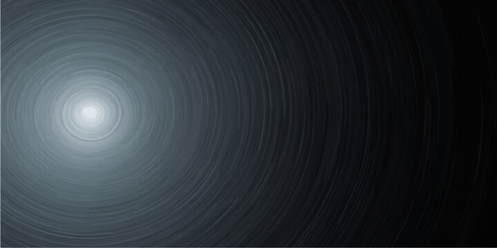 Abstract black and white background featuring a metallic spiral vortex and 3d steel pipe design with a blue light motion blur
