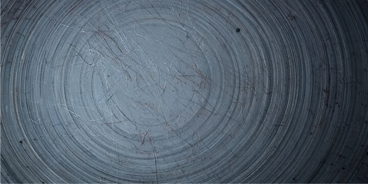 An old wooden texture background featuring a natural brown timber surface with close up macro details of circular tree rings, a round design pattern, and a textured material cut from nature