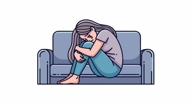 Woman curled up on sofa, conveying sadness and distress