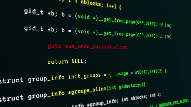 Animated digital screen showing scrolling green and red software programming programming code for development concepts.
