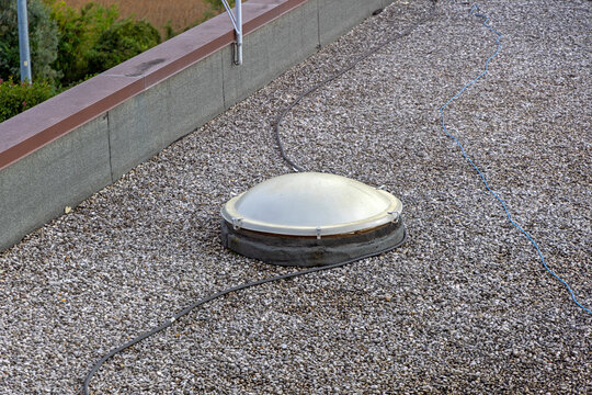One Dome Skylight at Gravel Flat Roof Industrial Building