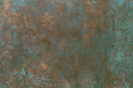 Old weathered bronze metal sheet with detailed copper corrosion patina texture