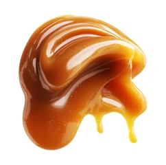 Caramel sauce smear closeup isolated on white background with clipping path, concept of sweetness and dessert texture © boule1301