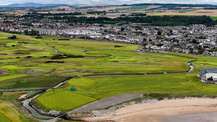 Fototapeta premium Aerial View of Carnoustie Golf Links and Coastal Town in Scotland