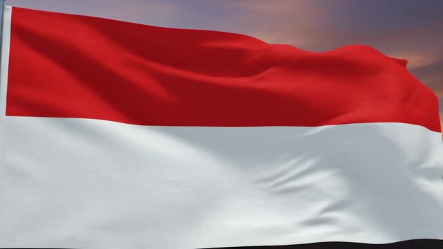 Indonesian National Flag Sang Saka Merah Putih Waving Against Sunset Sky
