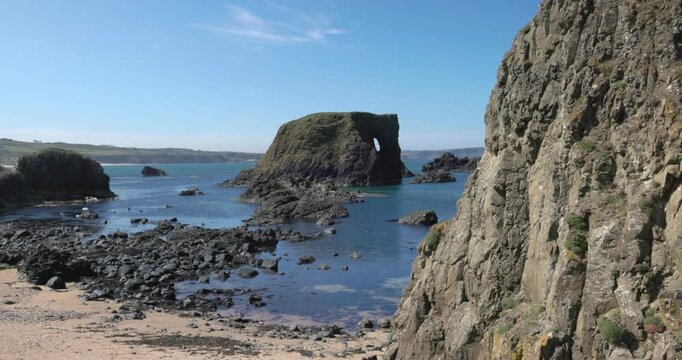 Elephant rock surrounded by a beautiful white sand coastline in Northern Ireland