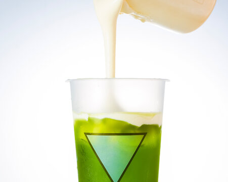 Pour the milkshake into a beverage glass.