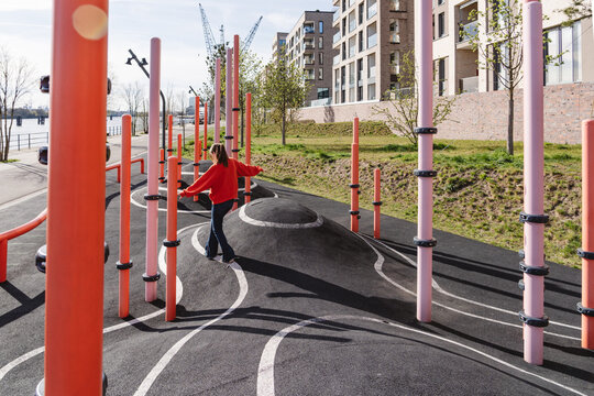 Balancing on a modern urban playground exploring independence