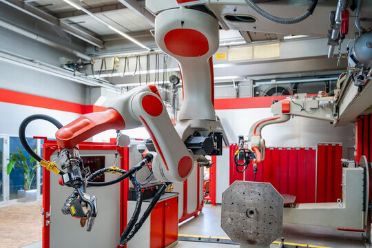 Modern industrial robot arm inside an automated factory