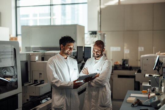 Scientist working on screen researching medicine in a laboratory