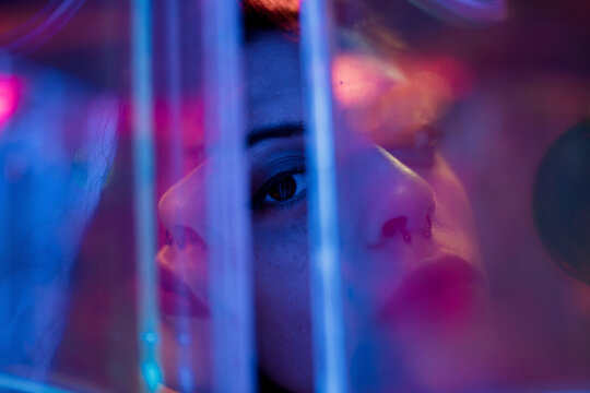 Abstract neon portrait with colorful light and soft focus blur