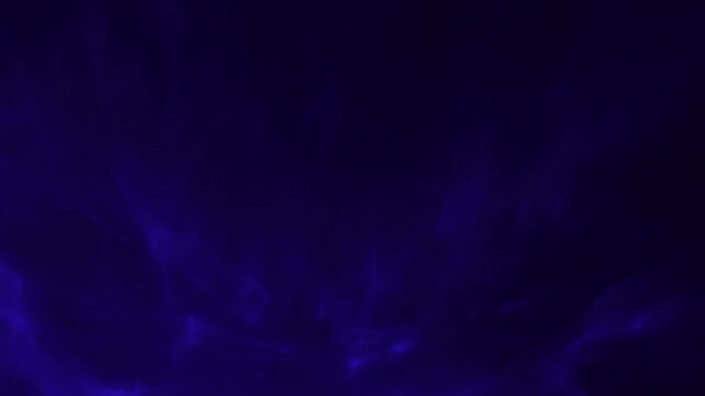 cinematic abstract background features deep indigo smoke undulating gently in dark moody atmosphere