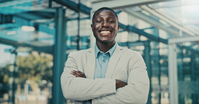 Portrait, business and black man with arms crossed in city, investing opportunity or financial career. Confident, professional or investor with ambition for wealth development, pride or smile in town