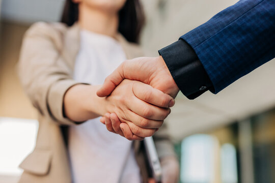 Close up of business handshake for new job hiring at the office